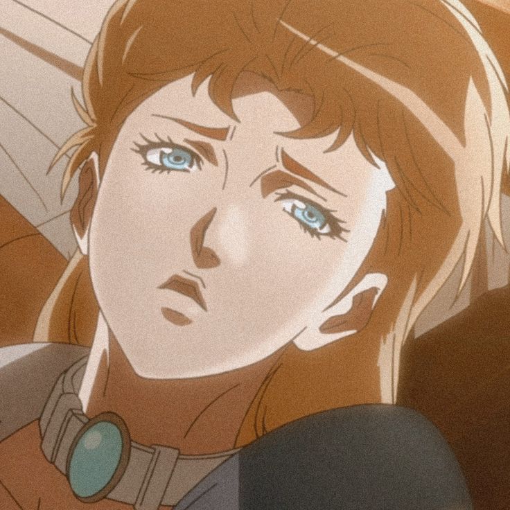 an animated image of a woman with blue eyes and brown hair looking at the camera