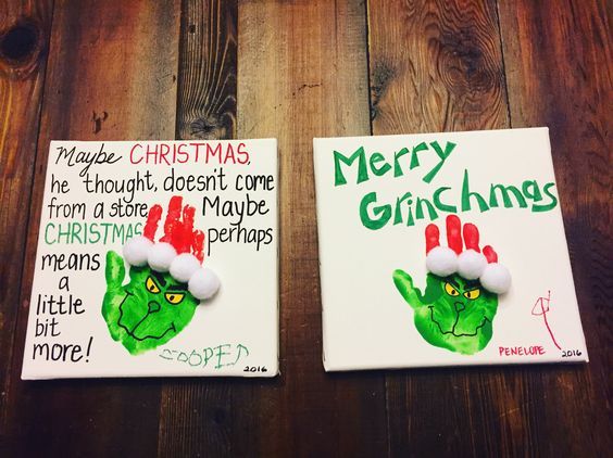 two christmas cards with hand prints on them