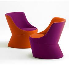 an orange and purple chair sitting next to each other