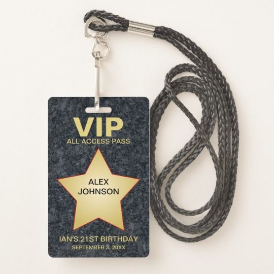 a black lanyard with a pink star on it and a name tag attached to the lanyard