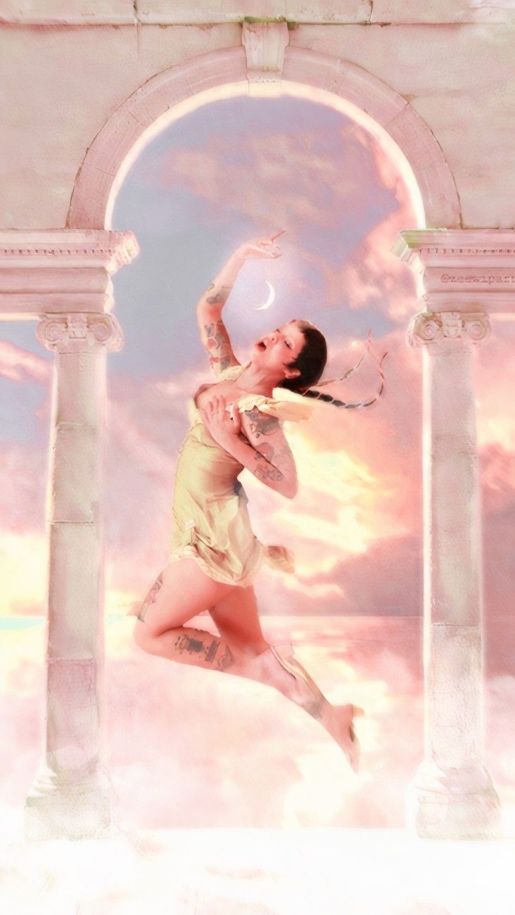 a woman is jumping through the air in front of an arch with clouds behind her