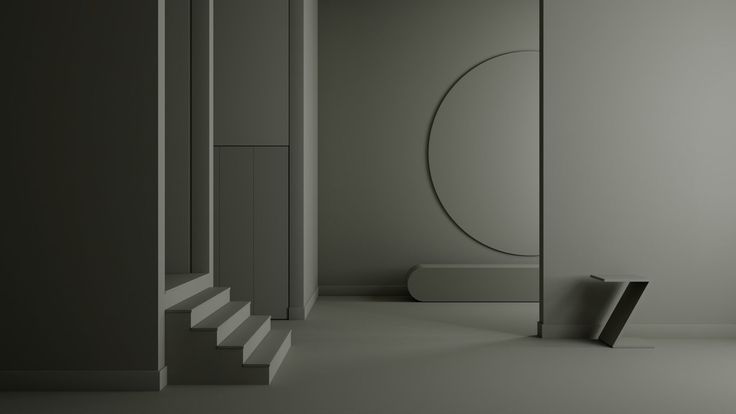 an empty room with white walls and stairs