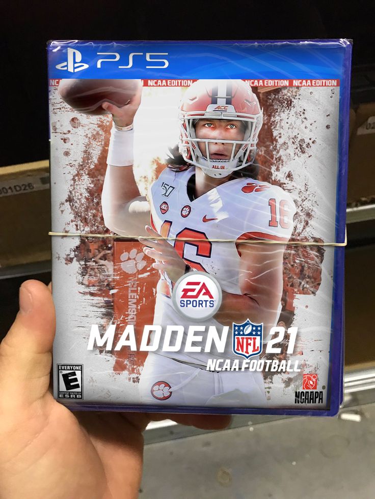 a person holding up a video game case in their hand with the image of a football player on it