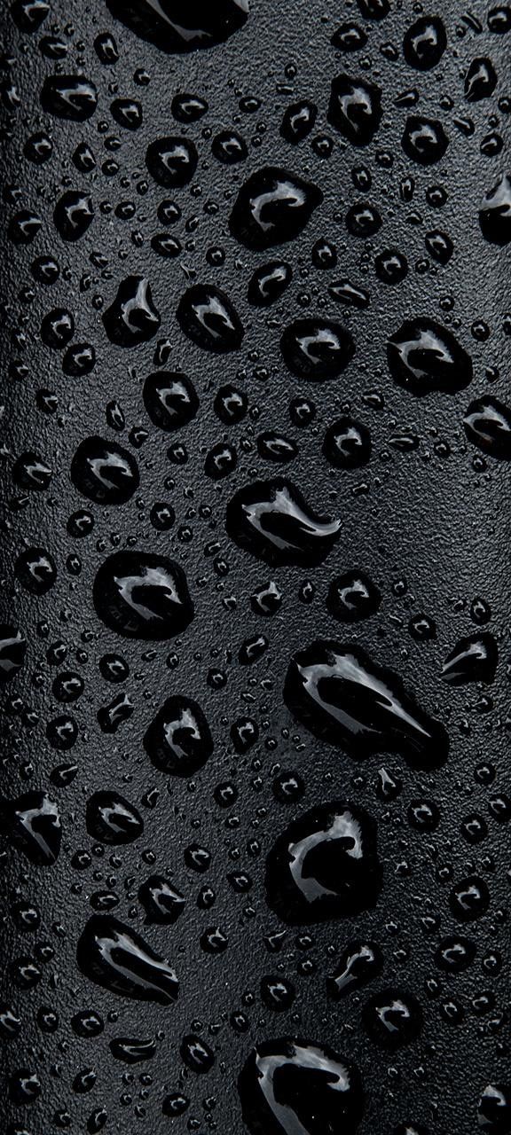 drops of water on a black surface