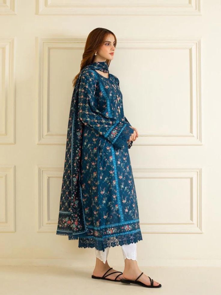 Introducing our vibrant and fashionable printed lawn shirt with dupatta perfect for adding a touch of elegance and style to your wardrobe. Made from high-quality lawn fabric, this shirt offers comfort and breathability, making it an ideal choice. Large chest 43" Length : 47" Dupatta Fabric : Lawn 2 piece dress M Blue Cambric Lawn Suit With Dupatta, Blue Cambric Straight Kurta Lawn Suit, Blue Mulmul Lawn Suit With Printed Motifs, Blue Cambric Salwar Kameez With Naqshi, Blue Cambric Lawn Suit With Naqshi Detailing, Blue Naqshi Lawn Suit In Cambric, Unstitched Cotton Lawn Suit With Printed Motifs, Unstitched Printed Lawn Suit With Straight Kurta, Unstitched Straight Kurta Lawn Suit