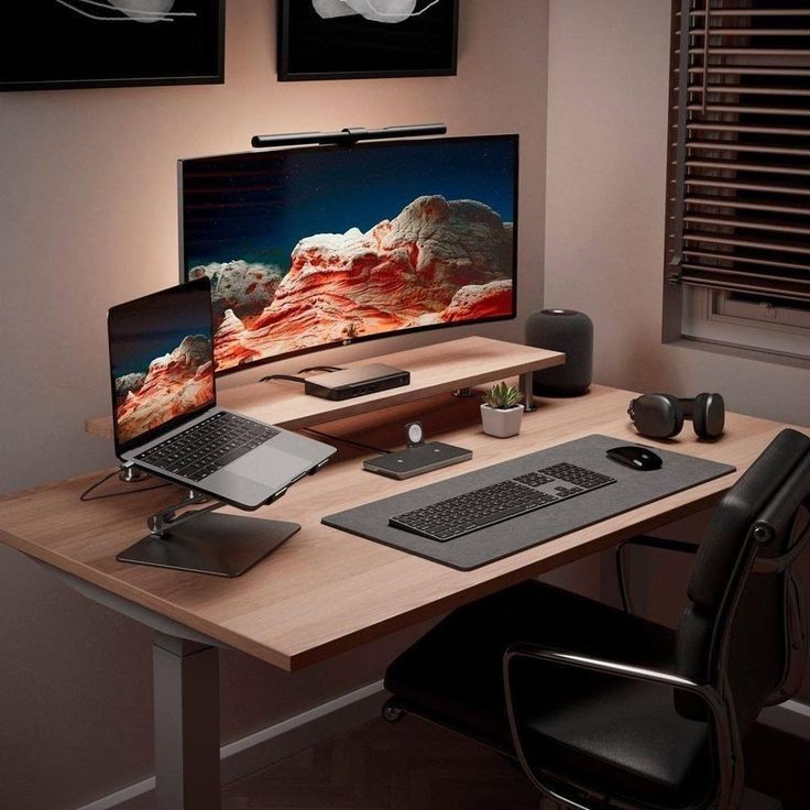 a computer desk with two monitors, keyboard and mouse next to each other on it