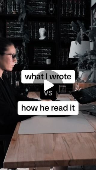 a woman sitting at a desk with a laptop computer in front of her and the words what i wrote vs how he read it