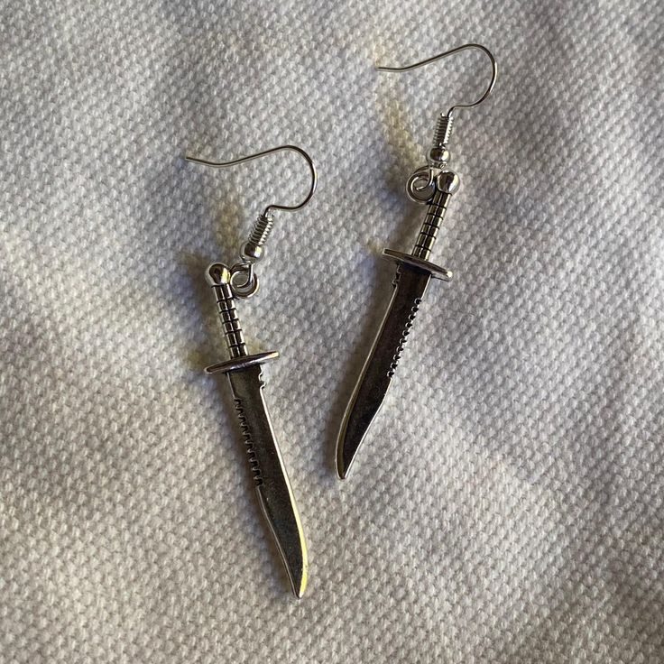 This pair is approximately 1" long. ------------------------------------ If you would like clip on earrings please leave a note with your order, all dangle earrings can be switched out for clipons! All earrings are brass & nickel free, the fish hook ones have rubber backings Knife Earrings, The Fish, Fish Hook, Clip On, Clip On Earrings, Etsy Earrings, Hair Clips, Dangle Earrings, Jewelry Earrings