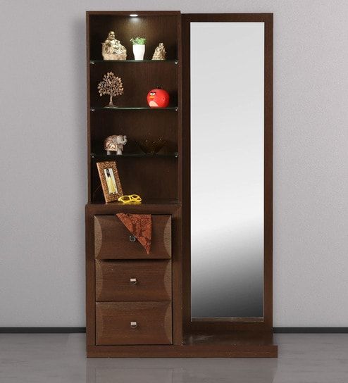 a wooden cabinet with mirror and drawers in front of the door, on top of a tile floor