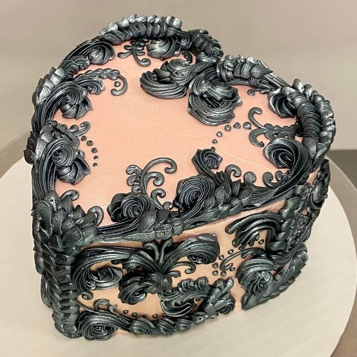 a decorative cake is sitting on a plate