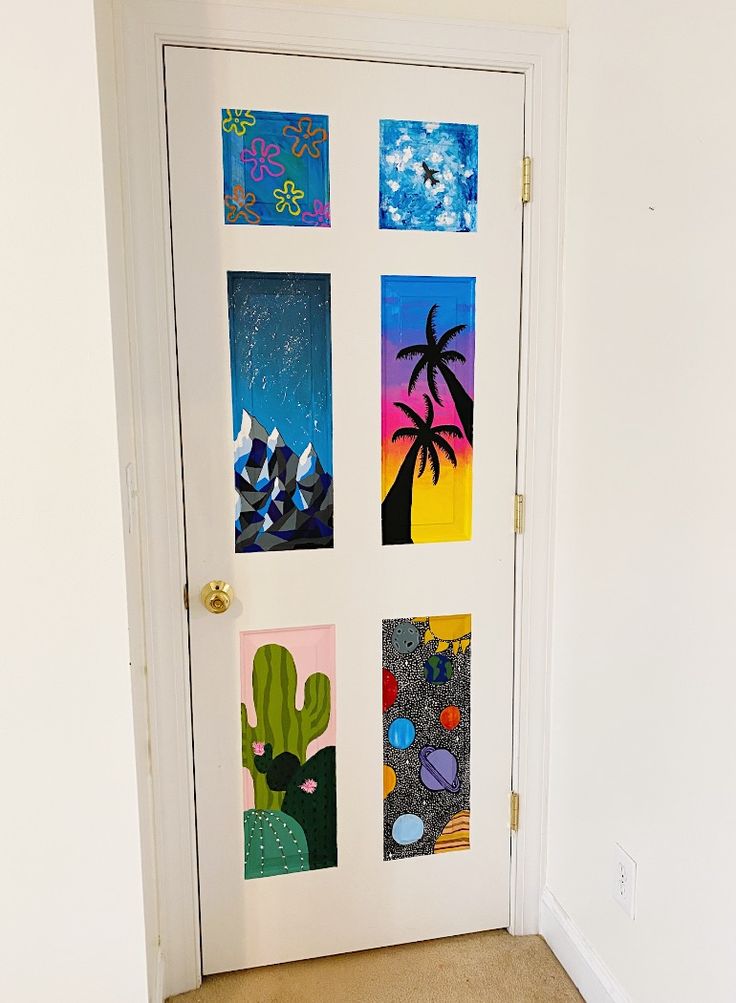 a white door decorated with colorful pictures and cactuses on the front doors side by side