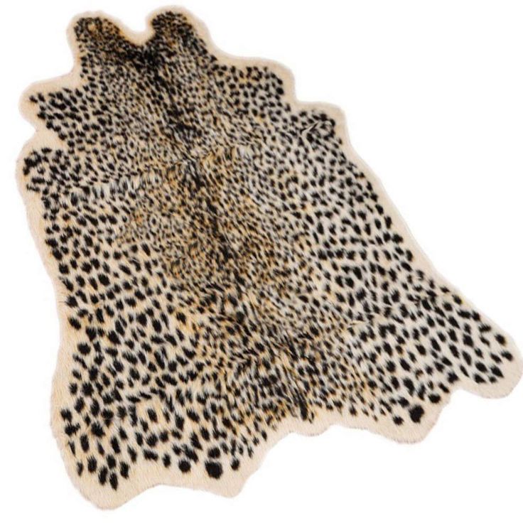 an animal print rug with black and white spots