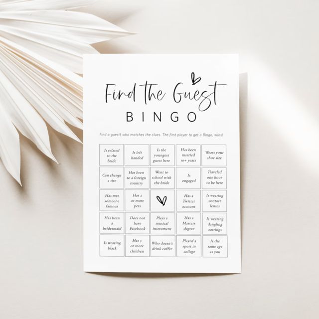 a white card with the words find the best bingo on it next to a palm leaf