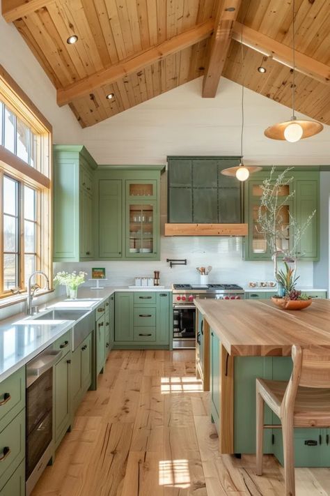 a large kitchen with green cabinets and wooden flooring is pictured in this image from the inside