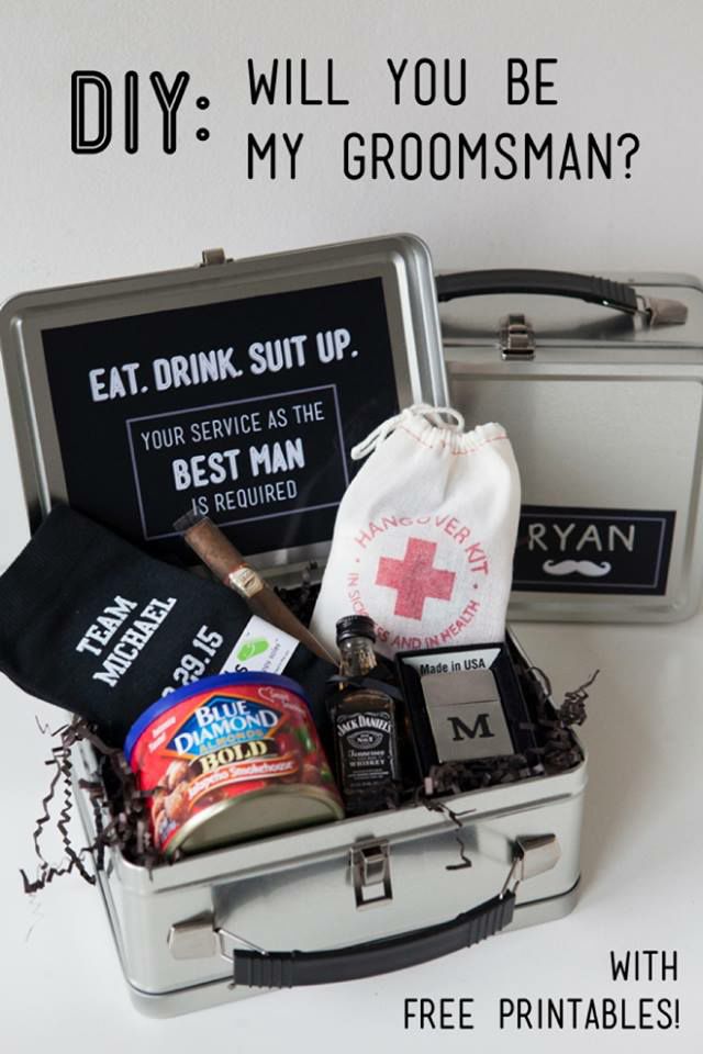 an open suitcase filled with food and drinks on top of a white table next to other items