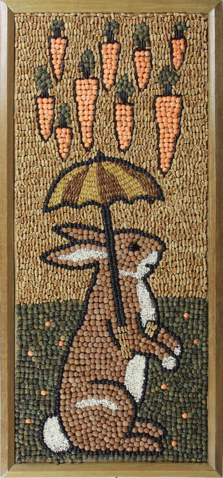 a painting made out of beads with carrots on it and a rabbit holding an umbrella