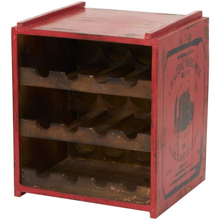 a red wooden wine rack filled with lots of bottles