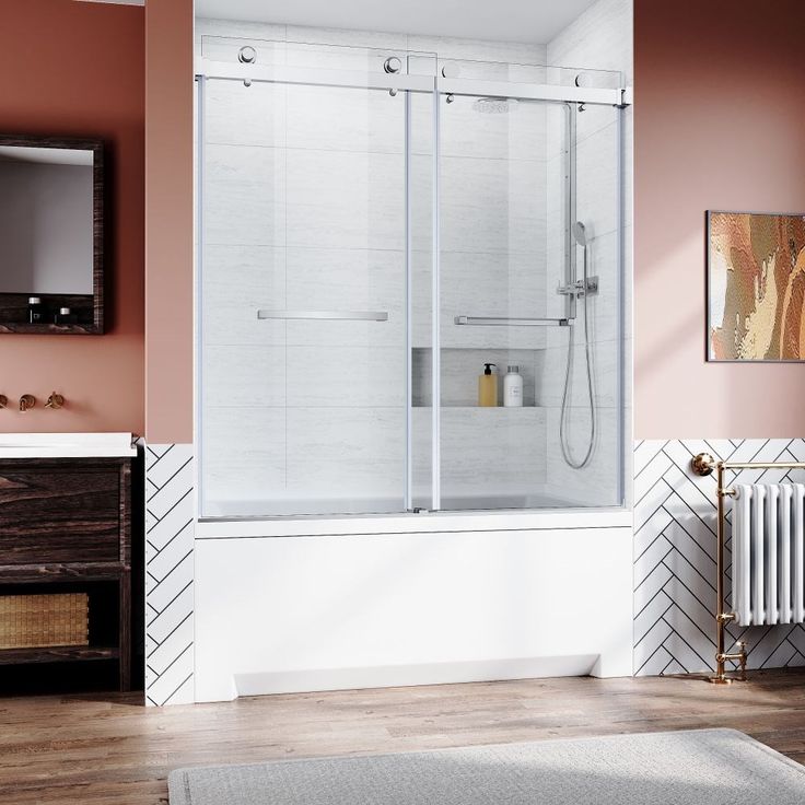 a bath room with a sink and a walk in shower next to a mirror on the wall