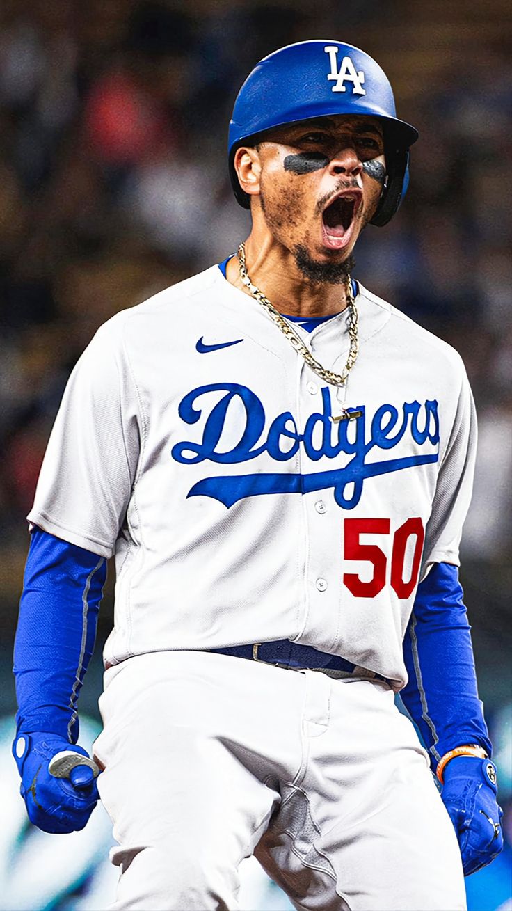 a dodgers baseball player with his mouth open