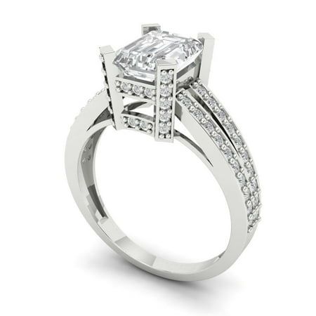 an engagement ring with a princess cut diamond in the center