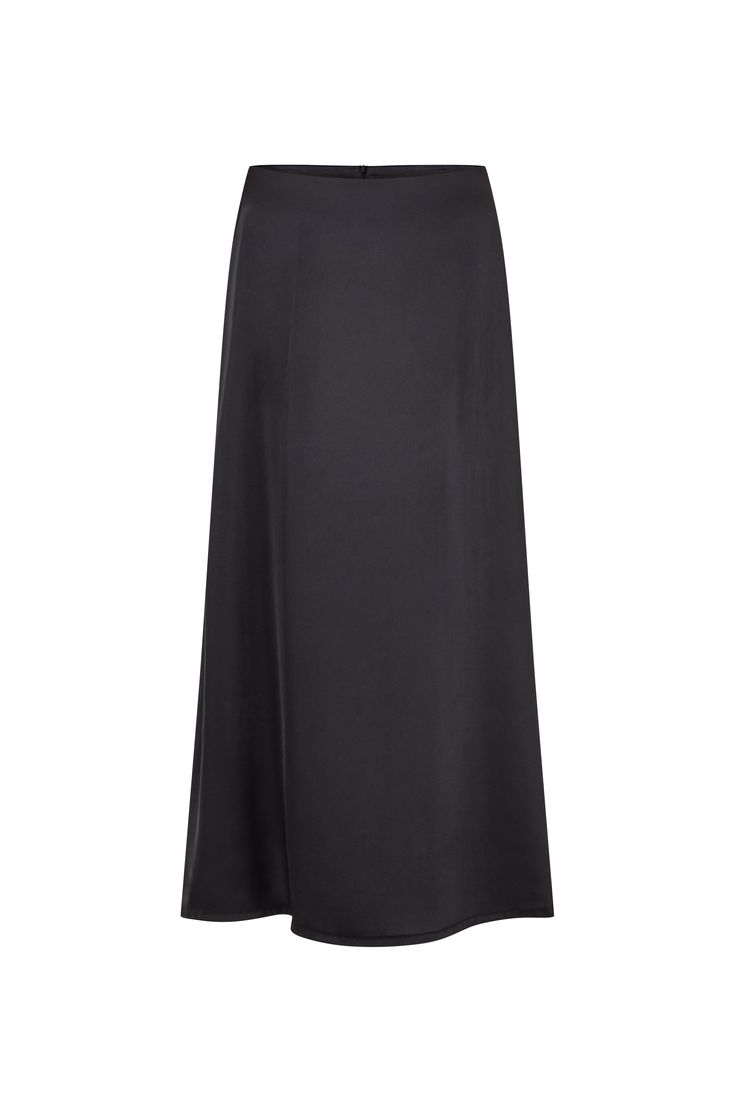 Introducing the Mon Cheri Silk Skirt. This low-waist, maxi-length masterpiece is crafted from a luxurious silky fabric and designed to flow and flounce with every step. Featuring a discreet zipper at the back, this skirt offers both style and convenience, ensuring a seamless fit that flatters your silhouette. Wear yours with the Mon Cheri Long Sleeve Crop for a daring look!  Thicker waistband for support Discreet zipper in the back  Maxi length Available in white and black Natural viscose silk