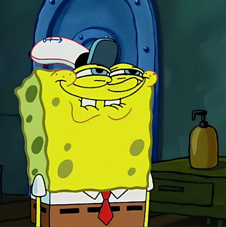 spongebob with glasses and a red tie standing in front of a blue toilet