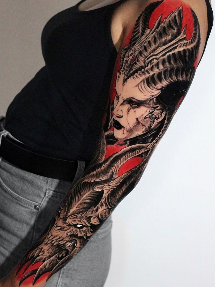 a woman with a dragon tattoo on her arm