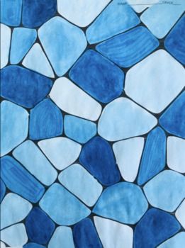 a blue and white mosaic tile pattern with lots of small stones on it's surface