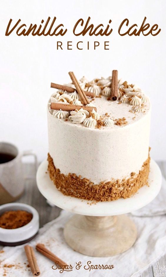 vanilla chii cake recipe on a white plate with cinnamon sticks and coffee in the background