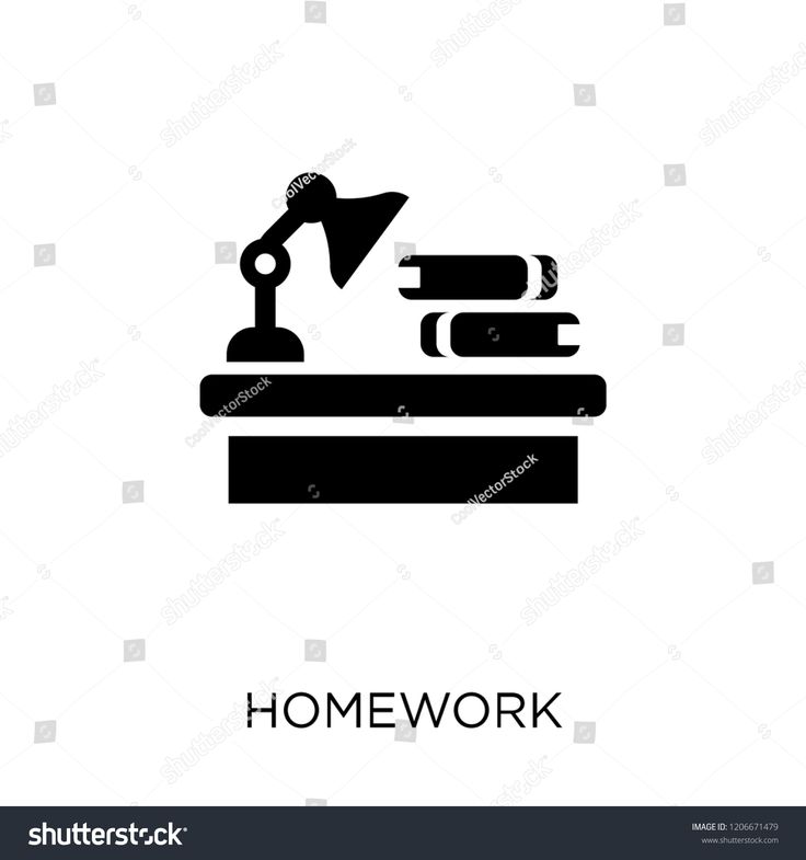 a desk lamp with books on it and the word homework