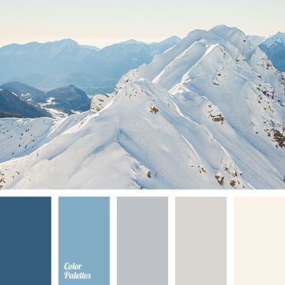 the color scheme is blue and white with mountains in the background