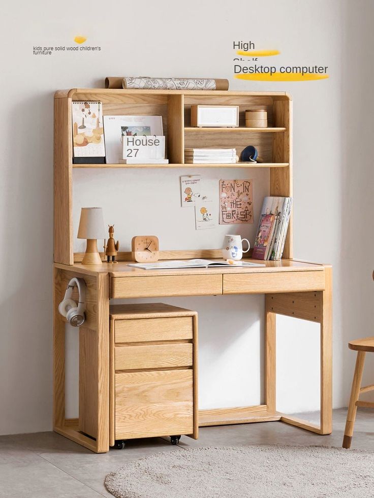 a wooden desk with drawers and shelves on the top, in front of a white wall