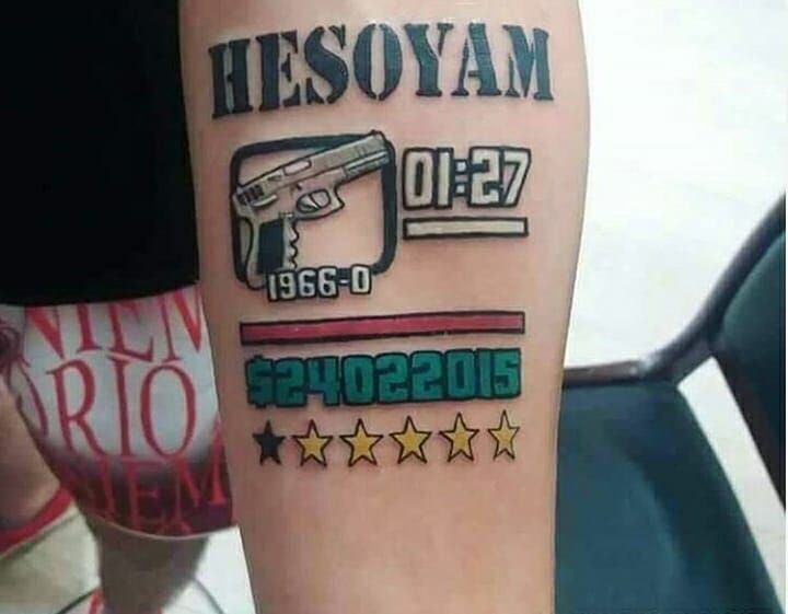 a person with a tattoo on their arm that says hesoyam and has five stars around it