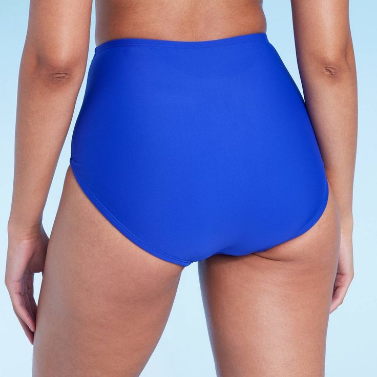 Add a pop of color to your swimwear closet with this Shirred High-Waist Full Coverage Bikini Bottom from Shade & Shore™. This high-waist bikini bottom features allover shirred detailing for a sweet finish. The stretchy fabric and full-elastic waistband provide comfortable movement, and the full-lining construction offers coverage for confident wear. Pair them with a matching bikini top to complete your swim style. Shade & Shore™: Found exclusively at Target. Blue Short-length Swimwear For Poolside, Blue Swim Skirt For Swimming, High Waist Solid Swim Skirt For Swimming, Solid High-waist Swimwear For Sunbathing, Blue Swim Skirt For Sports, High Waist Solid Color Swim Skirt, Blue Sports Swim Skirt, Solid Color High Waist Swimwear For Swimming, Solid High Waist Swimwear For Swimming