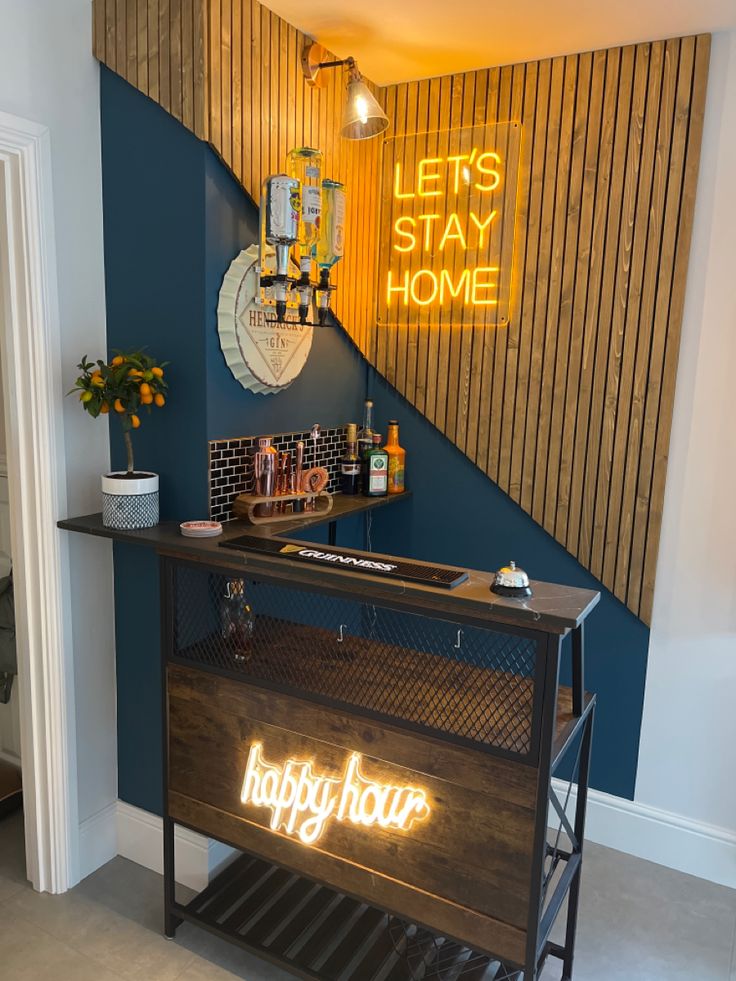 a bar with a neon sign that says happy hour on the front and back wall