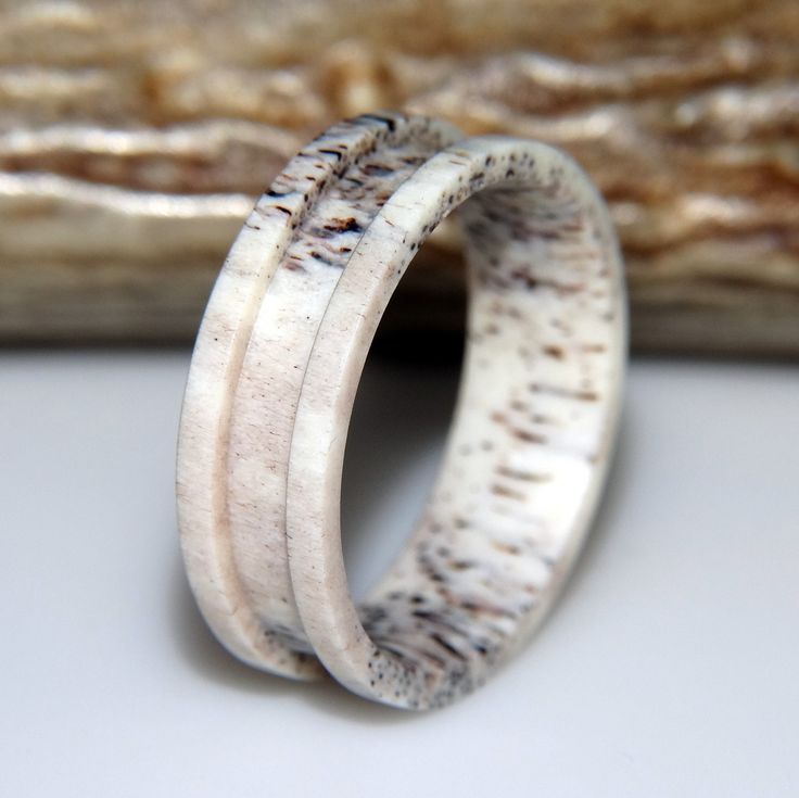 Naturally shed deer antler ring blanks ~2-2.5mm thick, 8mm wide and ~4mm wide center groove channel for inlay. This antler is sanded smooth and unfinished with a comfort fit interior profile for comfortable wear. Ready for any inlay material and sealing/finishing. US standard whole and half sizes 5-13 ring blanks to create beautiful, handcrafted rings. Great for personal use, selling or giving as unique gift. Deer Antler Ring Diy, Ring Made Out Of Deer Antler, Elk Antler Rings For Men, The Antlered Doe Rings, Dear Antlers, Antler Rings Antlerrings.com, Antler Rings, Deer Antler Jewelry, Deer Antler Ring