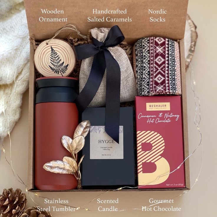 an open box containing coffee, tea and other items for the holiday gifting season