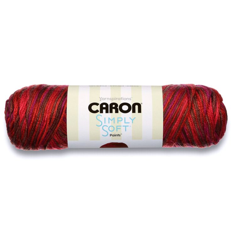 a red yarn ball with the words carbon simply soft on it