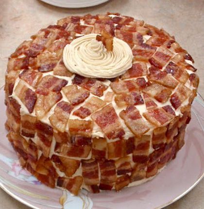 there is a cake that has been made to look like bacon on the top and bottom