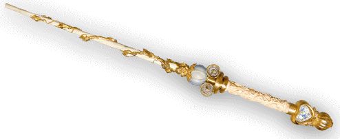 an ornate gold and diamond cane on a white background