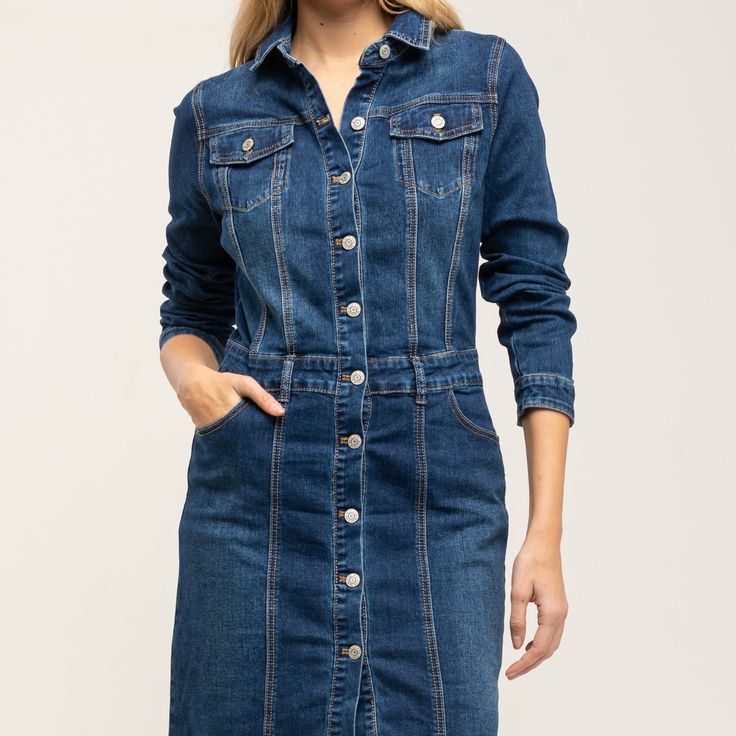 A classic fitted denim dress. Buttoned style with two regular pockets on the chest and seam details to create the perfect silhouette. The midi lenght makes it perfect for every day and more casual occasions 74% Cotton 24% Polyester 2% Viscose 2% Elasthane Wash Machine  30º ,  Press Medium  Temperature, Do  not  use spin-dry, Do not Bleach Classic Fitted Denim Dress, Elegant Medium Wash Denim Dress For Work, Elegant Denim Blue Denim Midi Dress, Elegant Midi Denim Dress, Elegant Midi Length Denim Dress, Elegant Denim Blue Midi Denim Dress, Elegant Denim Midi Dress For Work, Elegant Medium Wash Knee-length Dress, Elegant Knee-length Medium Wash Dress