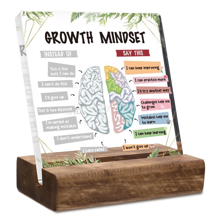 a wooden stand with a sign on it that says growth minds