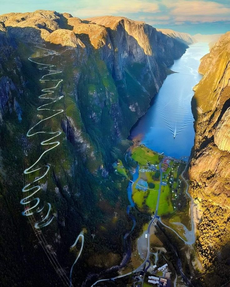 an aerial view of the mountains and water with writing on them that says welcome to new zealand