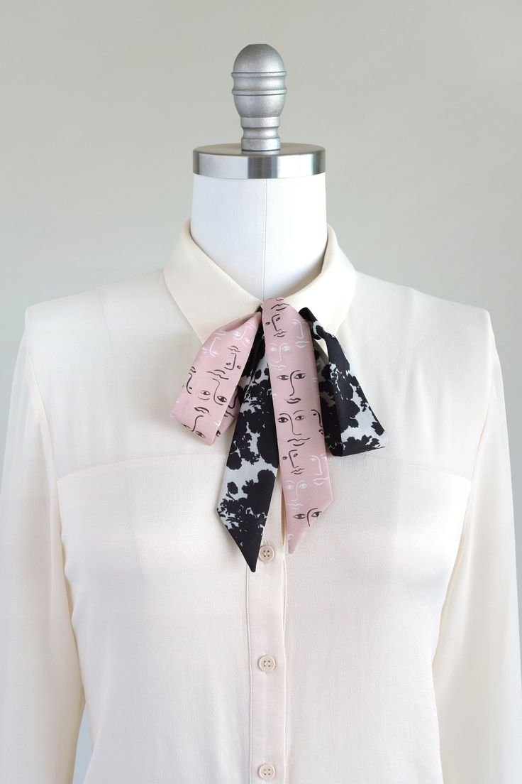 "Black, white, and pink neck scarf in a shadow bouquet/face print mix. Ready to ship, special edition midi-length skinny scarf designed by Cinne. Full of character with endless styling possibilities. Wear around your neck, in your hair, tied on your favorite bag, or around your wrist. Find more styling examples in second to last photo. Constructed entirely by hand with love and attention to every detail. . . . . . . . . . . . . . . . . . . . . . . . . . . . . . . . . . . . . . . . . . . . . . . Chic Pink Scarf As Gift, Trendy Black Silk Scarf For Spring, Spring Tie Neck Scarves With Ties, Spring Tie-neck Scarves With Ties, Spring Tie Neck Scarf With Ties, Black Silk Scarf For Spring Gift, Chic Neckwear For Spring Gifting, Chic Neckwear For Spring Gift, Black Silk Scarf As Summer Gift