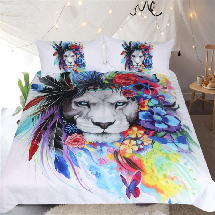 a bed with a lion and flowers on it