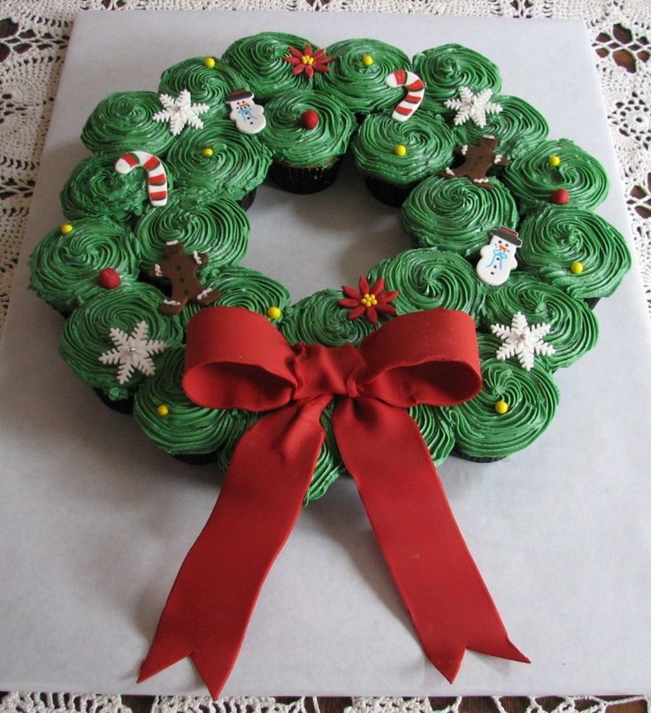 a cupcake decorated like a christmas wreath