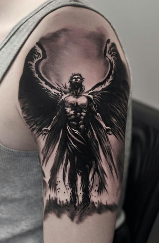 a man's arm with an angel tattoo on the back of his shoulder and chest