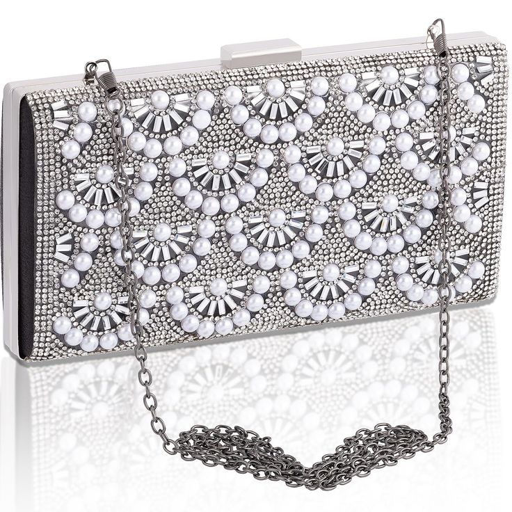 PRICES MAY VARY. CLASSIC EVENING BAG: Upgrade Bling Rhinestone Metal Hardshell & Made of high quality satin fabric. This evening clutch purses covered sparkling glitter that brings glamour to your formal dress; Durable hardware ( long & short chain).3-in-1 STYLE - Evening bag/Handbag/Shoulder chain bag,can be clutched by hands or hung on shoulders with the detachable chain. FEATURES OF THE DESIGN: The opening type is buckle, easy to open and close; has lining and One internal pocket with High qu Trendy White Evening Bag For Parties, Elegant Summer Party Shoulder Bag, Rectangular Evening Bag For Summer Parties, Elegant Summer Party Bags, Silver Party Bag For Summer, Silver Formal Bag For Summer, Elegant Holiday Bags, Purse Covers, Pearl Clutch