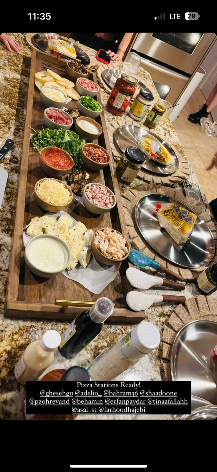 a table full of food is shown on the phone