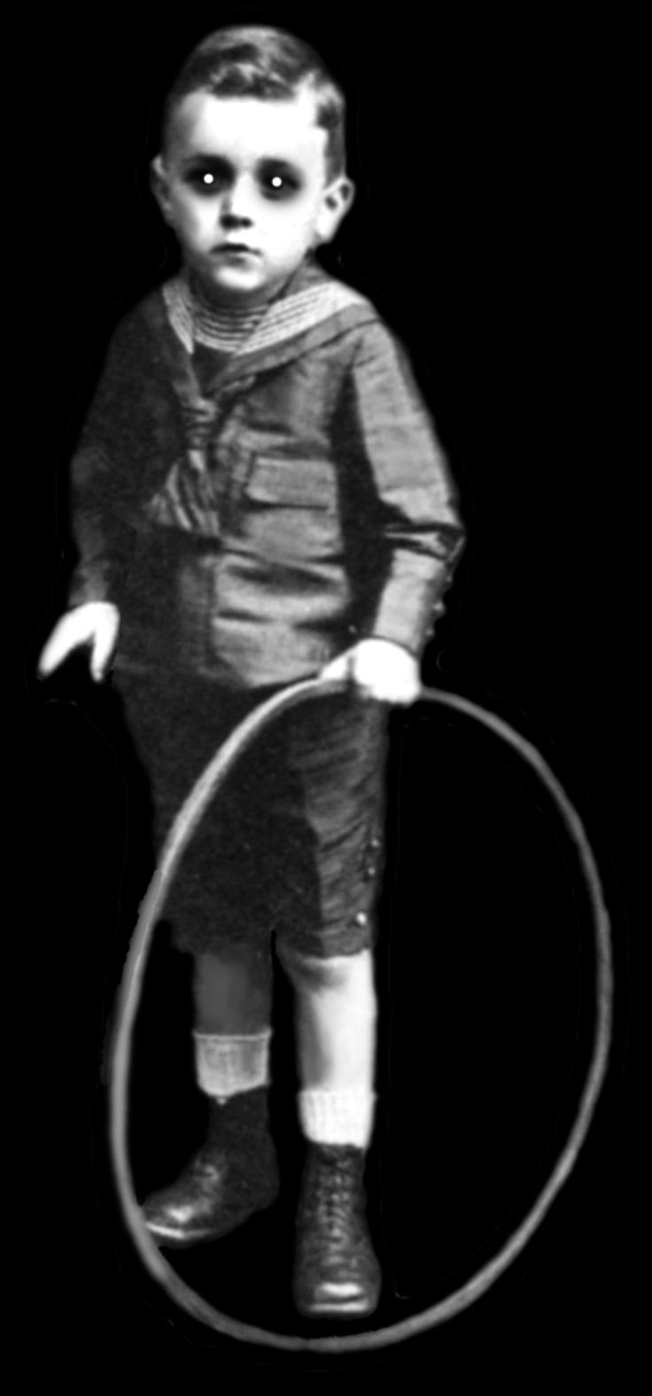 a young boy holding a hula hoop in front of a black background with the words,